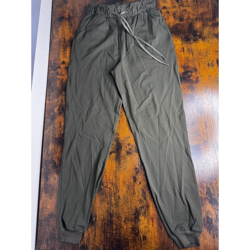 Lululemon On the Fly Jogger Pants Olive Green‎ Drawstring Elastic Waist Women 4